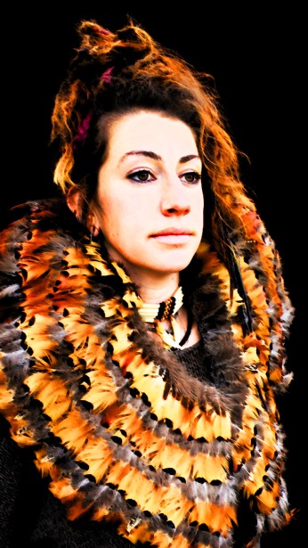 SHAMANIC ROADKILL CAPE - Made from recycled materials feathers from the capes of seven golden roadkill pheasants - 2 years in the making, completed at NOMADIC VILLAGE 2012, modelled beautifully by Visual & Shamanic Artist KATIE SURRIDGE of London.